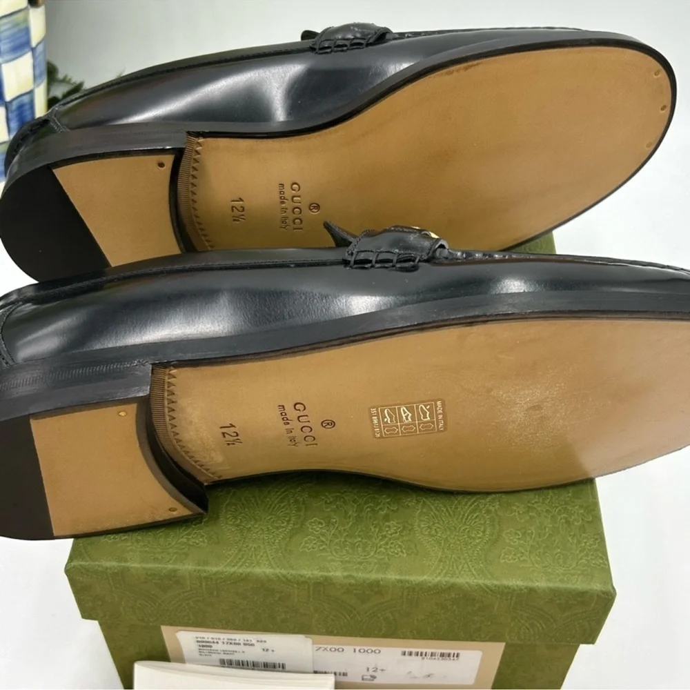 Men’s Gucci gold logo embellished leather loafers size 12.5 made in Italy
